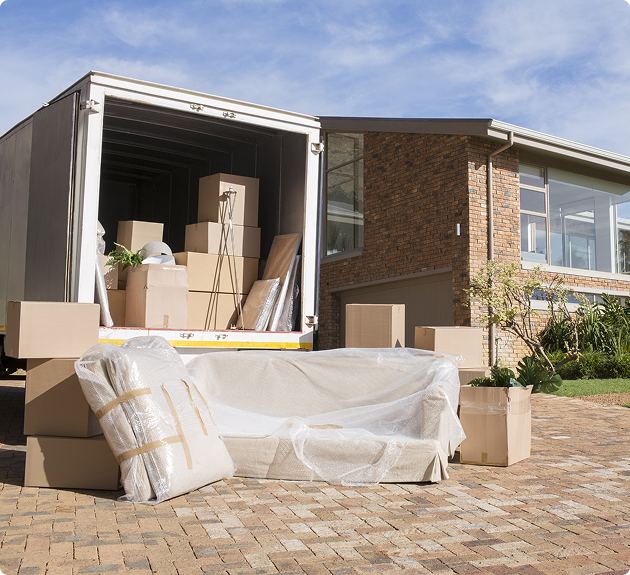 Unloading boxes at new home driveway